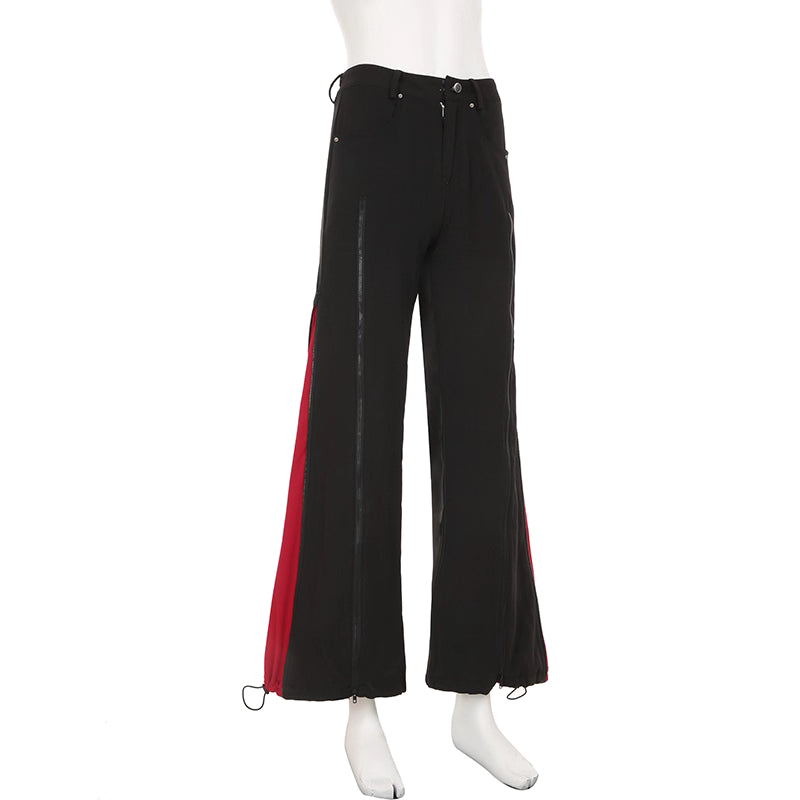 Black pants with red side panel on a mannequin against a white background